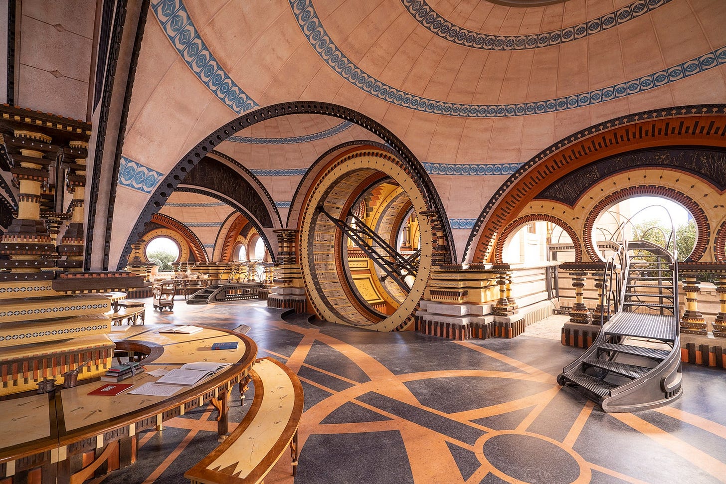 Image may contain Floor Flooring Indoors Architecture Building Museum Desk Furniture and Table