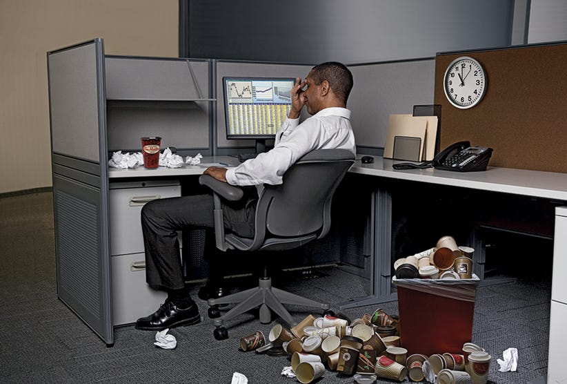 Working hard, hardly working: Our problem with productivity