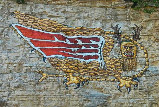 A modern reproduction of the "Piasa Bird", on the bluffs of the Mississippi River in Alton. Wings were not described in Marquette's 1673. (Burfalcy/CC BY SA 3.0) A modern reproduction of the "Piasa Bird", on the bluffs of the Mississippi River in Alton. Wings were not described in Marquette's 1673. (Burfalcy/CC BY SA 3.0)