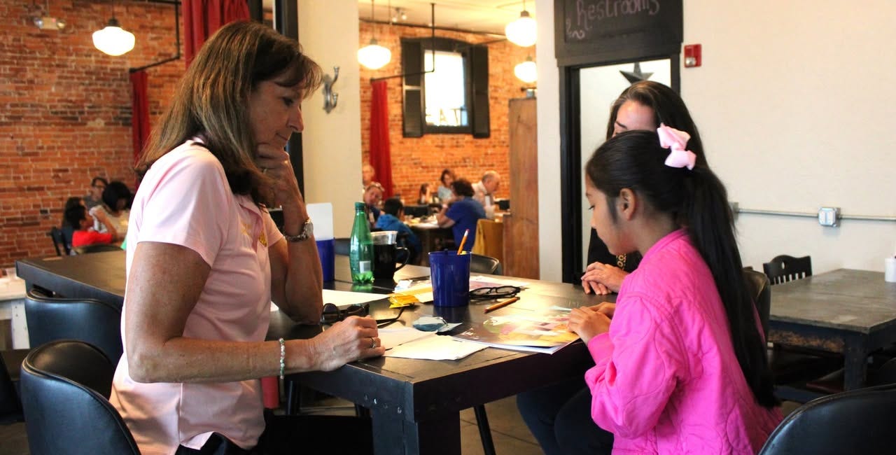 Dive Into Reading Returns: Local Restaurants and Volunteers Fight Summer Literacy Slide