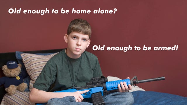 Teenage boy armed with an AR-15 so he can defend his home if necessary Teenage boy armed with an AR-15 so he can defend his home if necessary