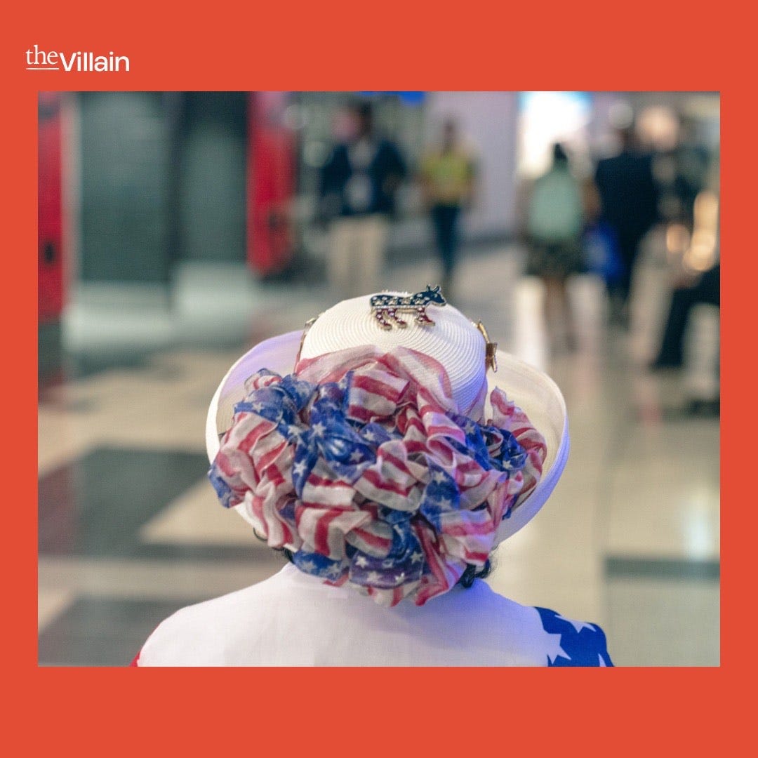Red, white, and blue decorated white hat at the DNC.