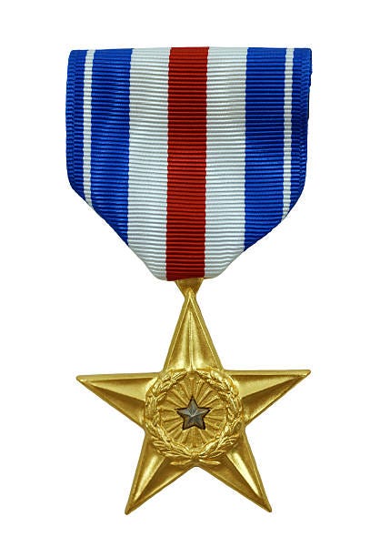 Silver Star Medal Isolated on white with clipping path. silver star medal stock pictures, royalty-free photos & images