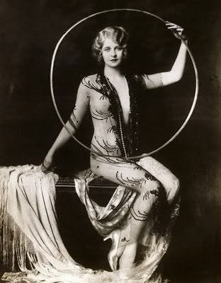Public domain portrait of Myrna Darby by Alfred Cheney Johnston, used to highlight the importance of iterative loops and structured research in developing historical characters.