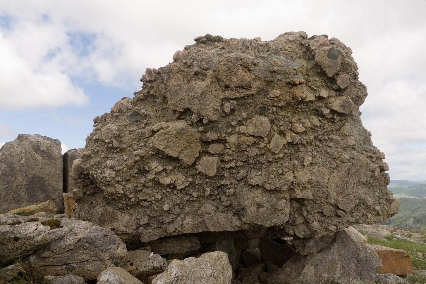 Block tuff: formed of a landslide down the side of a volcano Block tuff: formed of a landslide down the side of a volcano
