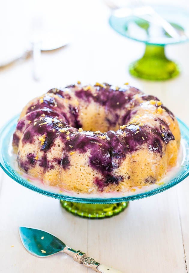 Blueberry Lemon Cake with Lemon Glaze - Almost more berries than cake in this soft, fluffy cake! The lemon glaze is plate-licking delish!! Blueberry Lemon Cake with Lemon Glaze - Almost more berries than cake in this soft, fluffy cake! The lemon glaze is plate-licking delish!!