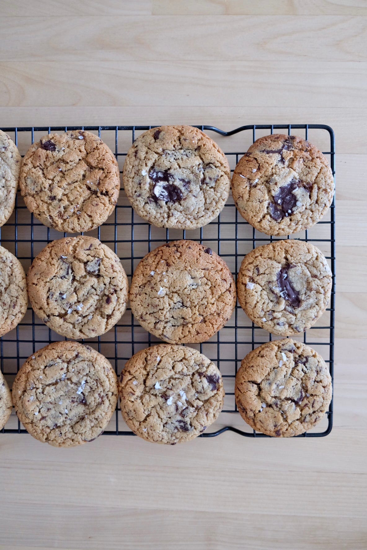 Wire tray of choc chip cookies with sea salt