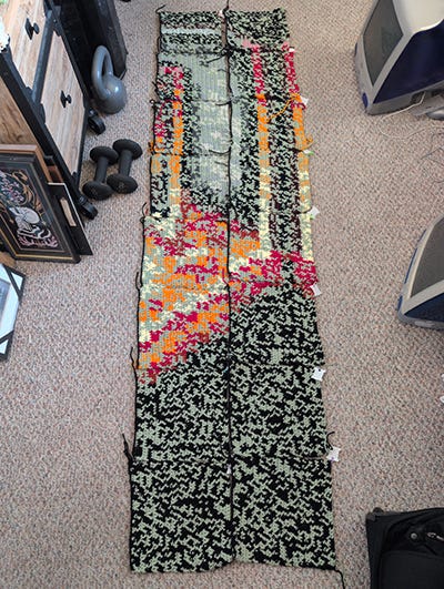Three images showing the progress of the tapestry, including a yarn inventory list and stitch count