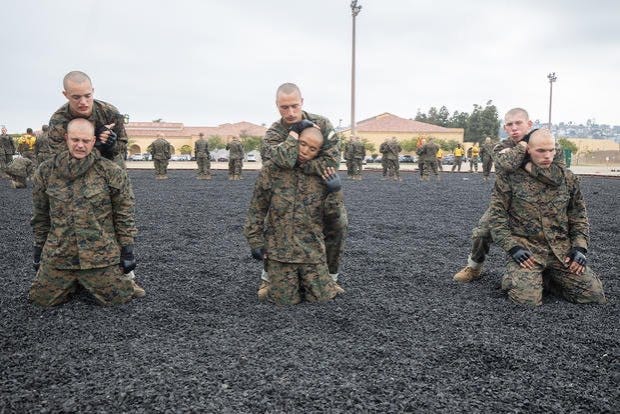 A group of soldiers in uniform

Description automatically generated