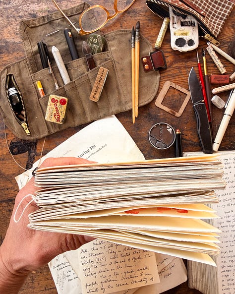 worn handbound notebooks, filling up, loved