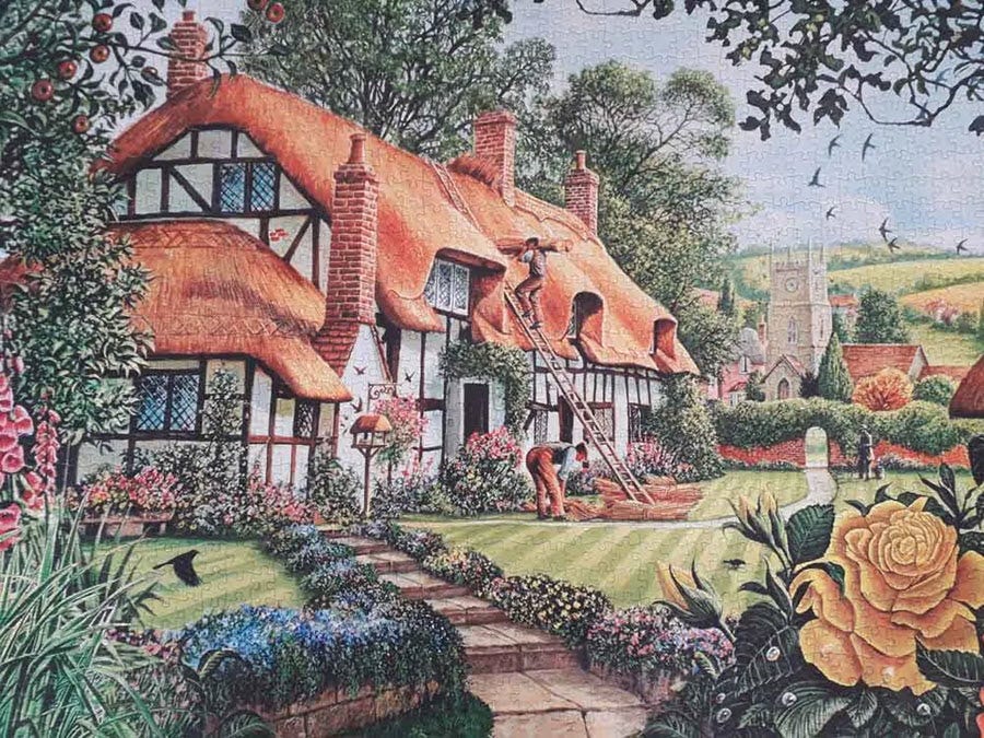 jigsaw puzzle of a cottage garden and gardener