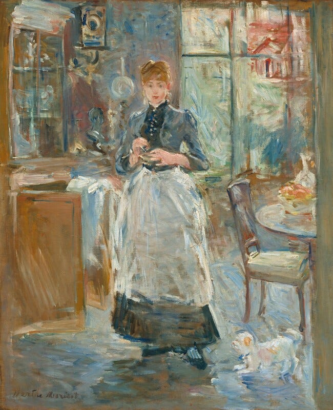 A young woman with pale, peach skin wearing a white apron over an ankle-length navy-blue dress stands in a dining room in this vertical painting. The painting is created using loose brushstrokes throughout. The woman stands facing and looking out at us. Her auburn-brown hair is pulled up into a bun, and bangs sweep across her forehead. Her eyebrows are slightly raised, her deep pink lips are closed in the hint of a smile, and she holds her hands at her chest. Some details throughout the painting are indistinct because of the loose painting style but she might hold a mixing bowl. The high-necked bodice of the dress has buttons down the front, and the apron falls to mid-shin. A tall curio cabinet fills the space to our left and brushes the top edge of the canvas. It seems to be filled with white or silver serving pieces, and a white cloth is draped over one of the open cabinet doors below. A clock hangs on a wall over an oil lamp between the woman and curio cabinet. Light pours in through a tall window or French doors behind the woman to our right. Roughly painted forms suggest a house and landscape beyond. One chair is pulled up to a round table that is cut off by the right edge of the canvas. A decanter, perhaps glass, and bowl of peach and rose-colored fruit sit on the table. A small white dog with tan spots scampers at the woman’s feet near the chair. The artist signed the painting in brown in the lower left corner: “Berthe Morisot.” A young woman with pale, peach skin wearing a white apron over an ankle-length navy-blue dress stands in a dining room in this vertical painting. The painting is created using loose brushstrokes throughout. The woman stands facing and looking out at us. Her auburn-brown hair is pulled up into a bun, and bangs sweep across her forehead. Her eyebrows are slightly raised, her deep pink lips are closed in the hint of a smile, and she holds her hands at her chest. Some details throughout the painting are indistinct because of the loose painting style but she might hold a mixing bowl. The high-necked bodice of the dress has buttons down the front, and the apron falls to mid-shin. A tall curio cabinet fills the space to our left and brushes the top edge of the canvas. It seems to be filled with white or silver serving pieces, and a white cloth is draped over one of the open cabinet doors below. A clock hangs on a wall over an oil lamp between the woman and curio cabinet. Light pours in through a tall window or French doors behind the woman to our right. Roughly painted forms suggest a house and landscape beyond. One chair is pulled up to a round table that is cut off by the right edge of the canvas. A decanter, perhaps glass, and bowl of peach and rose-colored fruit sit on the table. A small white dog with tan spots scampers at the woman’s feet near the chair. The artist signed the painting in brown in the lower left corner: “Berthe Morisot.”