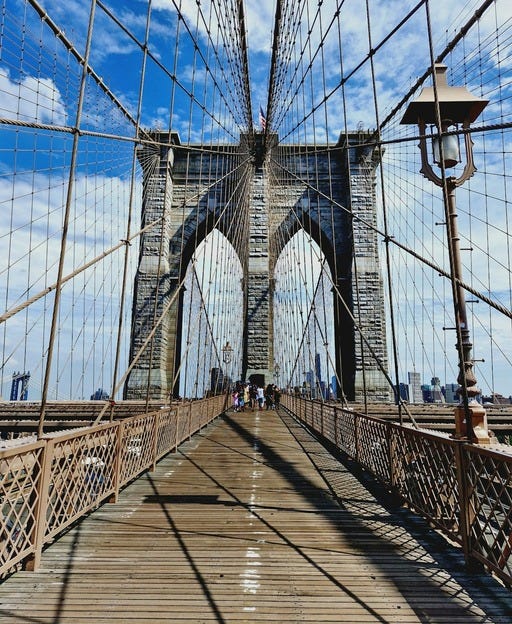 May be an image of the Brooklyn Bridge