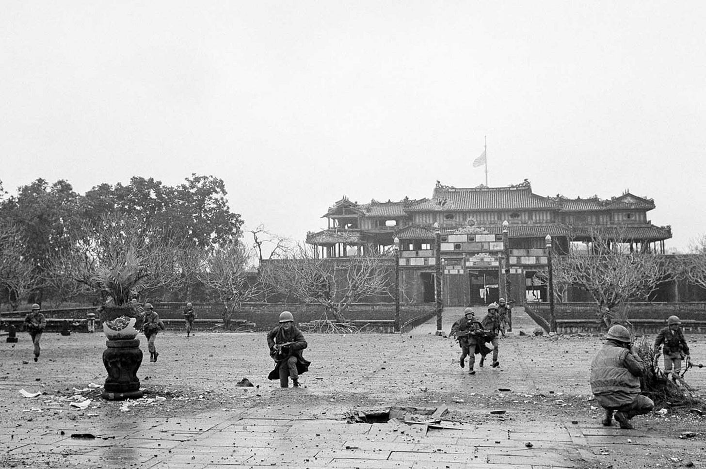 February 26, 1968, Hue: U.S. Marines and Vietnamese troops advance through the heavily damaged Imperial Palace, recaptured after 25 days of intense fighting and bombardment during the Tet Offensive. February 26, 1968, Hue: U.S. Marines and Vietnamese troops advance through the heavily damaged Imperial Palace, recaptured after 25 days of intense fighting and bombardment during the Tet Offensive.