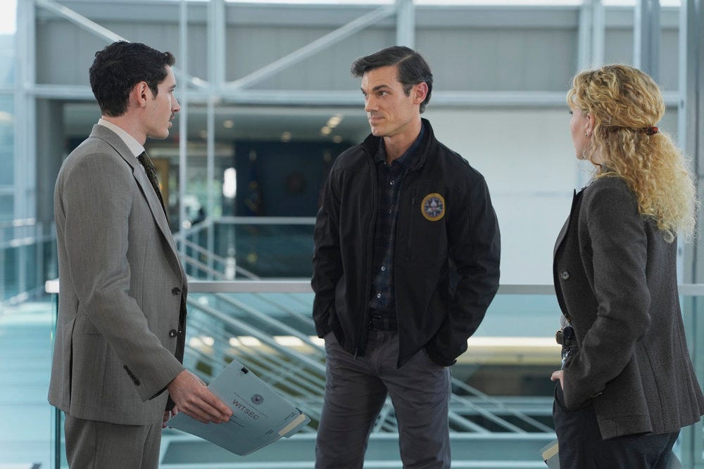 Line of Fire Episode 5 "Cul de Sac" Laith Khalifeh as Raul Amara, Robert Lenzi as Marshal Stevens, and Kat Cunning as Clare inside the FBI headquarters talking about going undercover Line of Fire Episode 5 "Cul de Sac" Laith Khalifeh as Raul Amara, Robert Lenzi as Marshal Stevens, and Kat Cunning as Clare inside the FBI headquarters talking about going undercover