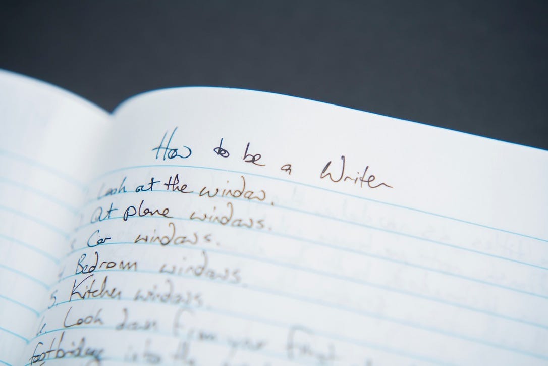 Written text in a notebook, "How to Be a Writer."