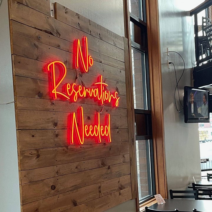 Indoor sign and a frybread.
