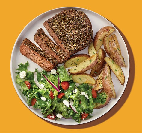 Vibrant shades of orange and yellow bring Meati food and packaging photography to life.
