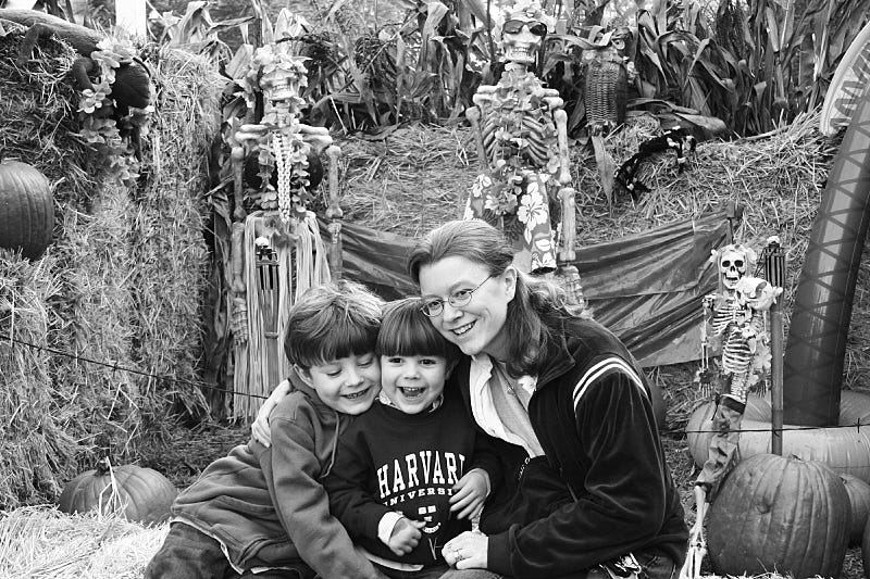 Family photo in a pumpkin patch