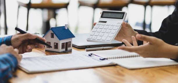 Businessmen, real estate agents discuss house purchase prices, fee, mortgage, interest, rent, cash flow, loan. Businessmen, real estate agents discuss house purchase prices, fee, mortgage, interest, rent, cash flow, loan. real estate cpa for rental properties stock pictures, royalty-free photos & images