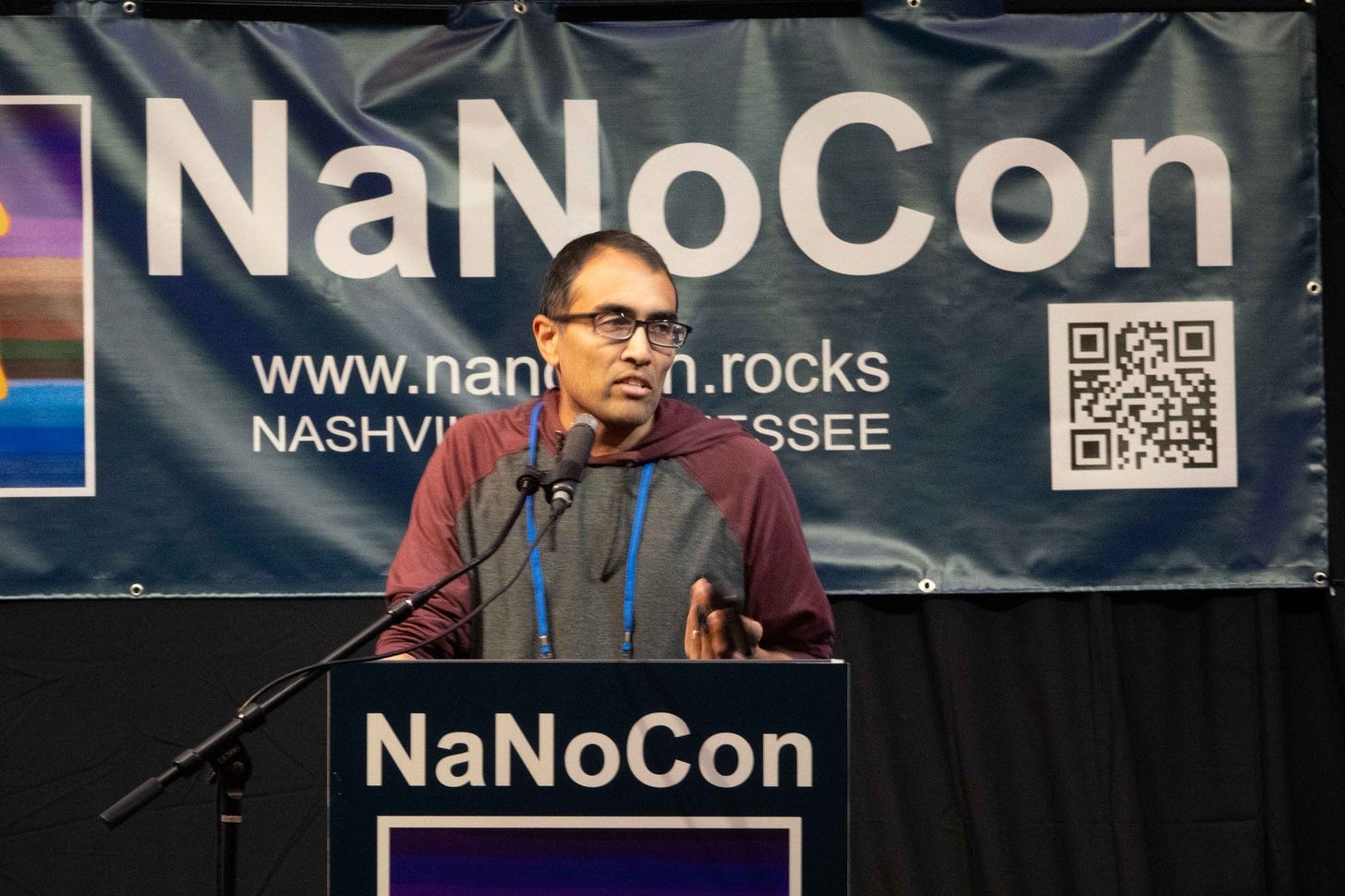 Photo of Hemant Mehta presenting.