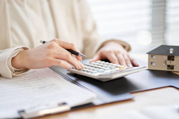 Asian women taking real estate quotes Asian women taking real estate quotes real estate cpa for rental properties stock pictures, royalty-free photos & images