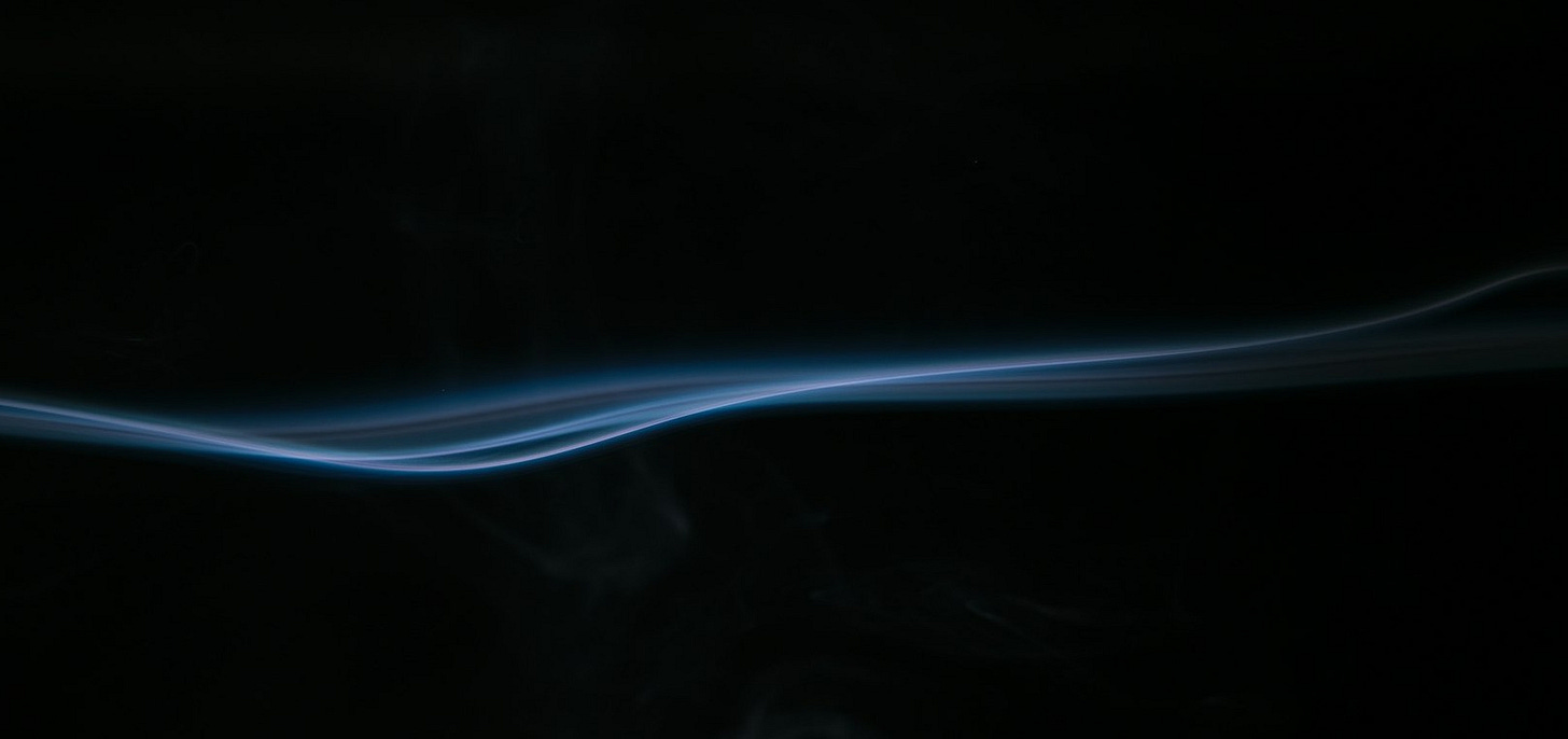 white smoke on black background