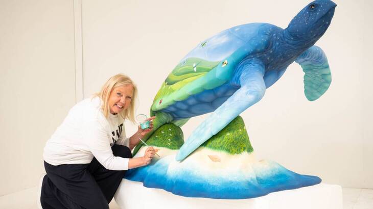Deborah Meaden painting a turtle