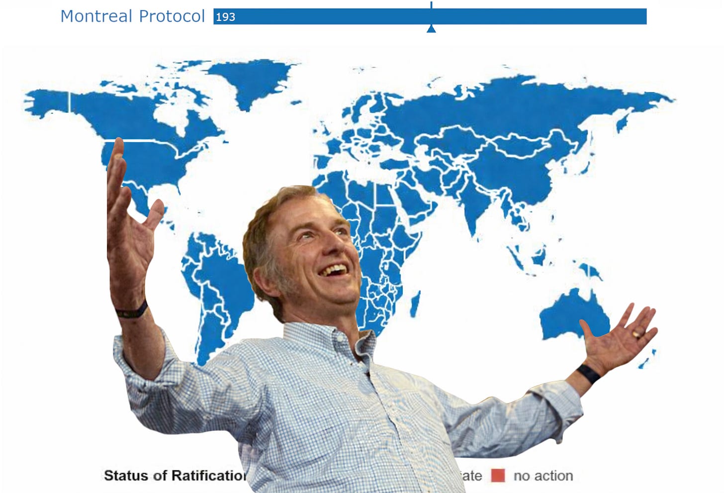 Smiling man with arms raised before world map,