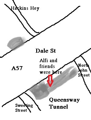 drawing of a few streets and a red arrow