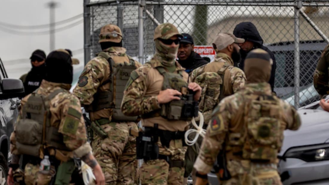 Arrests by masked federal agents face criticism