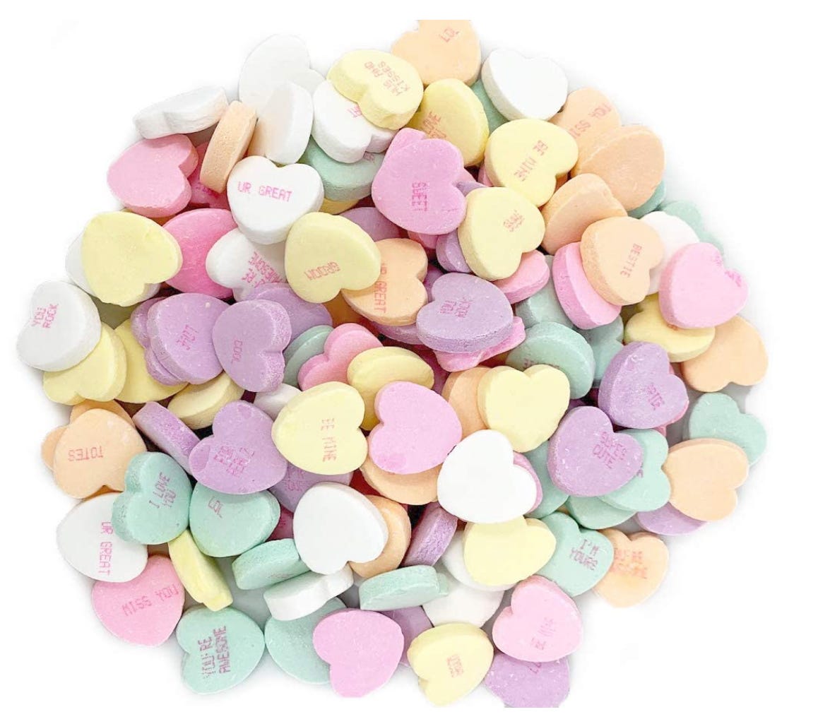 An assortment of conversation hearts, looking not especially appetizing. An assortment of conversation hearts, looking not especially appetizing.