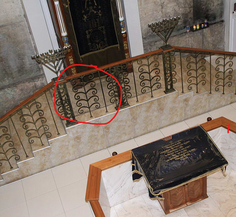 A room with a stone wall and a stone staircase

AI-generated content may be incorrect.