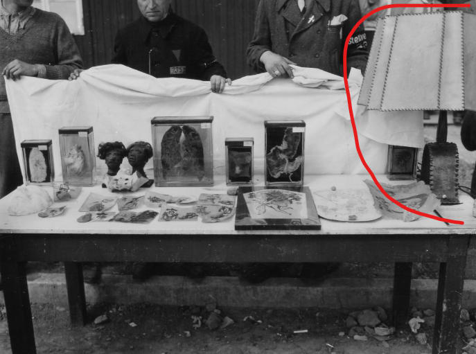 A table with a table with a table with objects on it

AI-generated content may be incorrect.