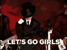 a woman with a veil on her face says let 's go girls