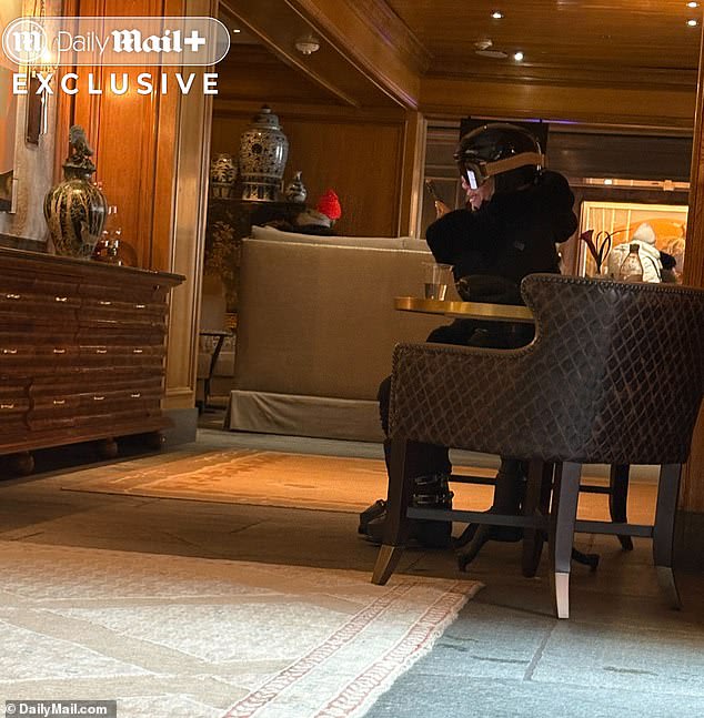 Pictured: Dressed in all-black ski gear, Tracy Duhon sits in the one of the common rooms of the St Regis Aspen Resort while on a getaway with her lover, Texas Attorney General Ken Paxton