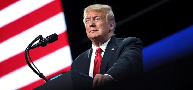 A person in a suit and tie

AI-generated content may be incorrect.