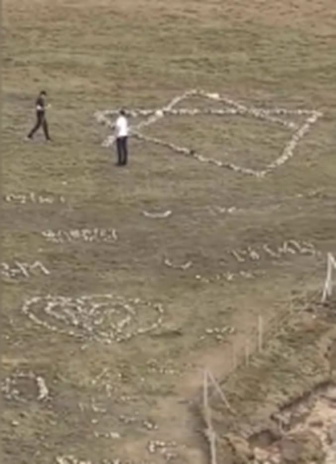 People walking in a field

AI-generated content may be incorrect.