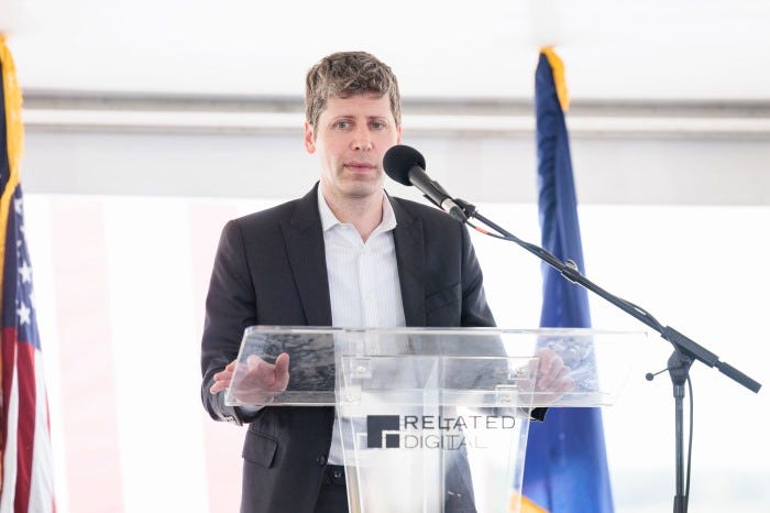 OpenAI CEO Sam Altman at a lectern.
