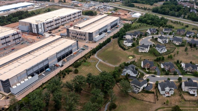 An Amazon Web Services data center is shown near a neighborhood in Stone Ridge, Virginia, in 2024. Northern Virginia is the top data center market in the U.S. (Nathan Howard/Getty Images) An Amazon Web Services data center is shown near a neighborhood in Stone Ridge, Virginia, in 2024. Northern Virginia is the top data center market in the U.S. (Nathan Howard/Getty Images)