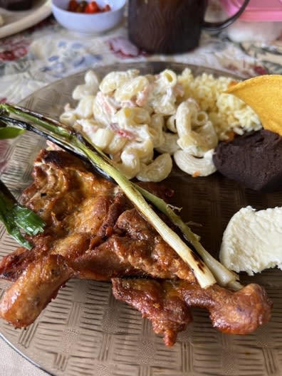 A plate of food on a table

AI-generated content may be incorrect.