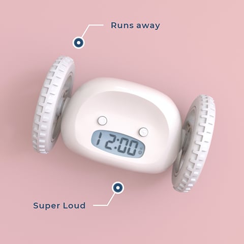 Alarm clock with large wheels on its side.