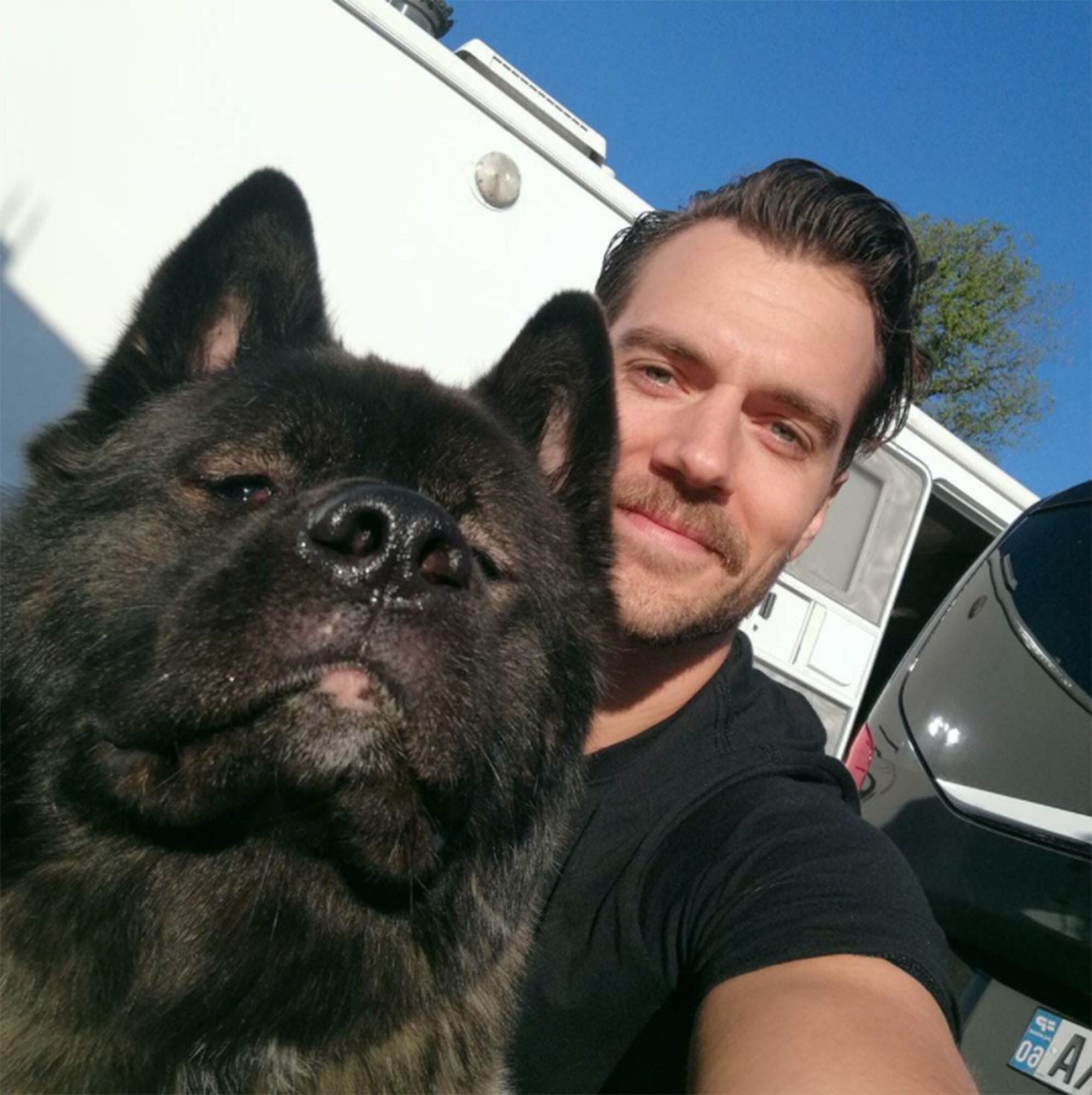 The Witcher star Henry Cavill goes public with his new girlfriend on dog  walk