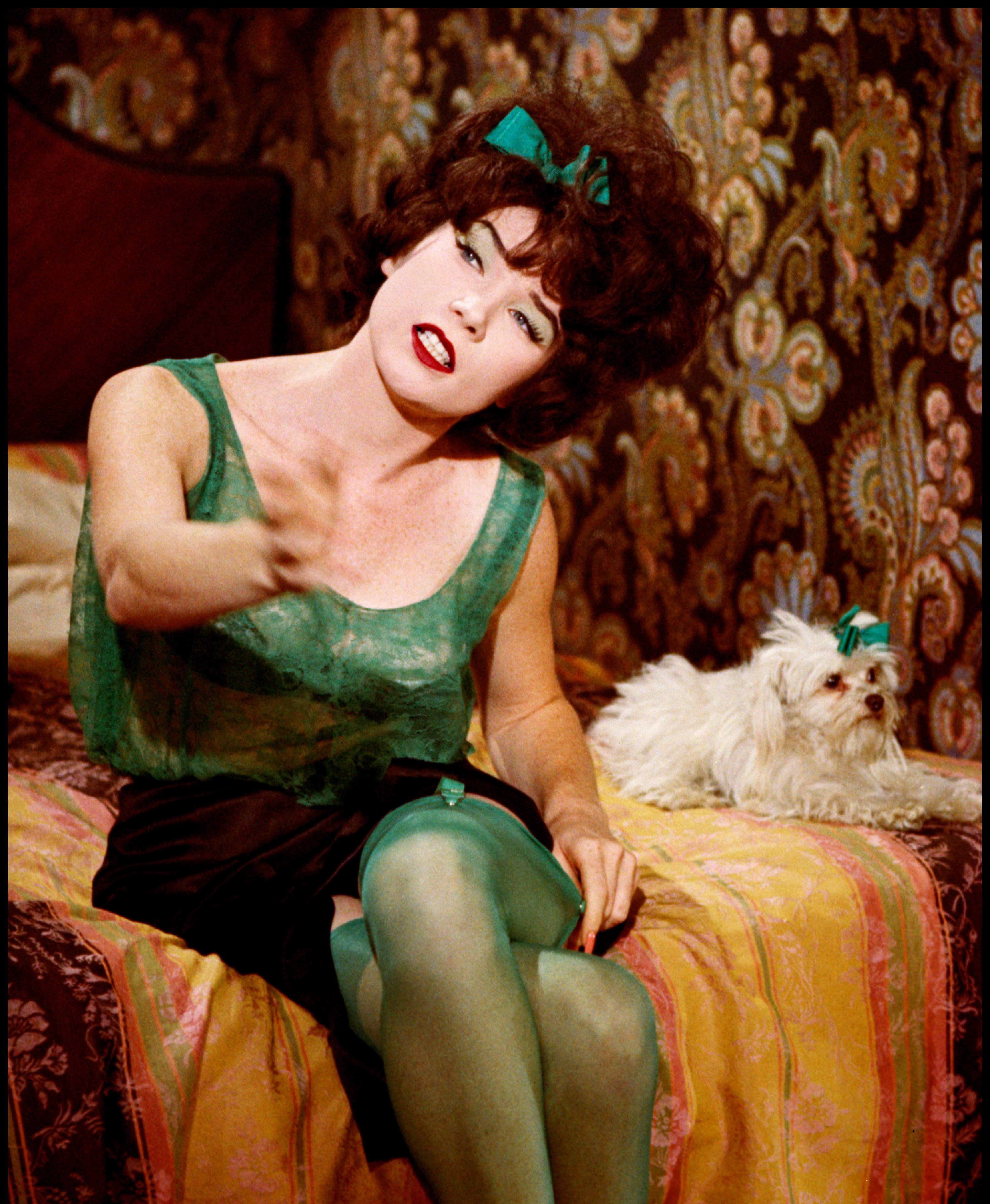 Irma La Douce wears green stockings - by Annette Richardson