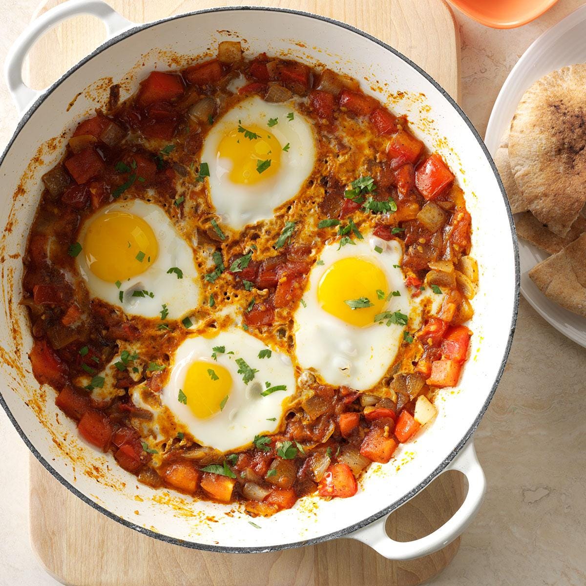 Alright my fellows, finally got my hands on an ostrich egg. I need ideas,  was thinking shakshuka. Whatcha got? : r/KitchenConfidential