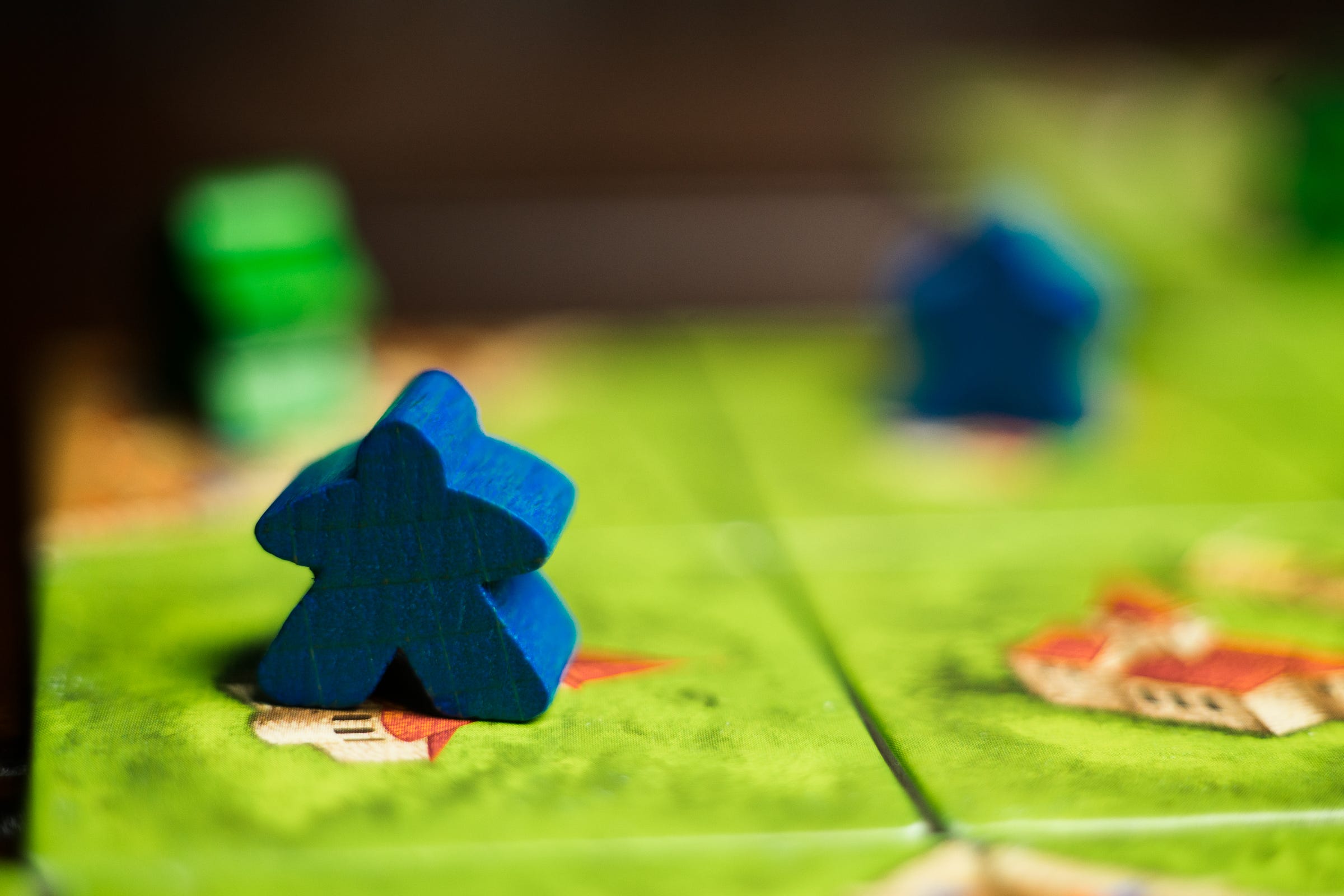 What Is A Meeple? History of the iconic board game piece. - There