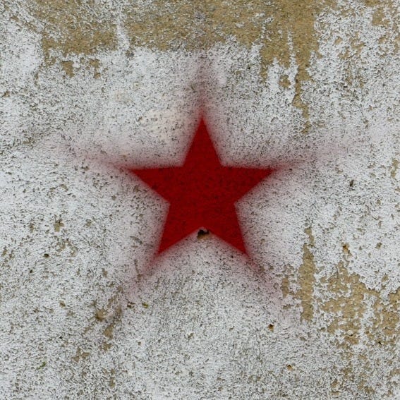 There Rises A Red Star logo