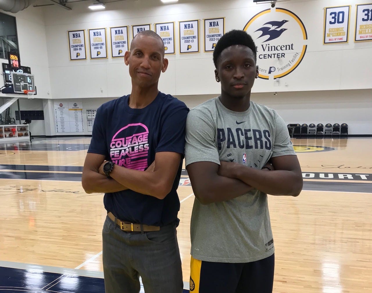 Former Indiana Pacer Reggie Miller (L), and other Pacer greats and