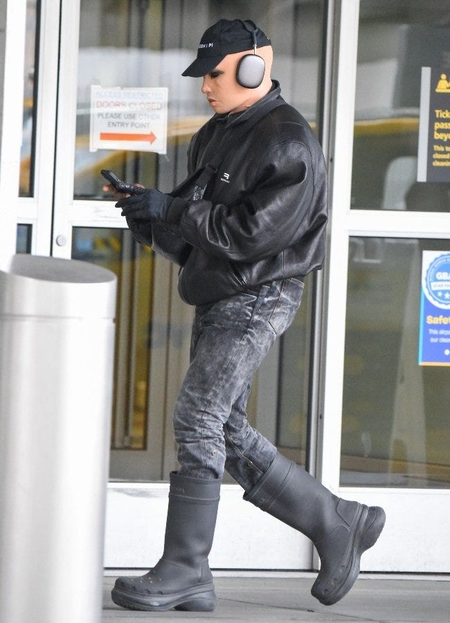 Kanye West Slips On Balenciaga Boots for Shopping With North West –  Footwear News