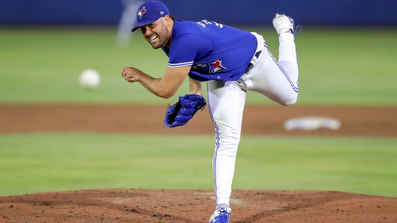 Toronto Blue Jays starting pitcher Robbie Ray throws a pitch to